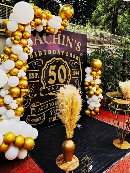 Celebrating a milestone? I create stylish, personalized themes for adults, like this "Aged to Perfection" 50th birthday. The classic black and gold design, complete with a custom backdrop and elegant pampas grass, is perfect for a sophisticated celebration.
