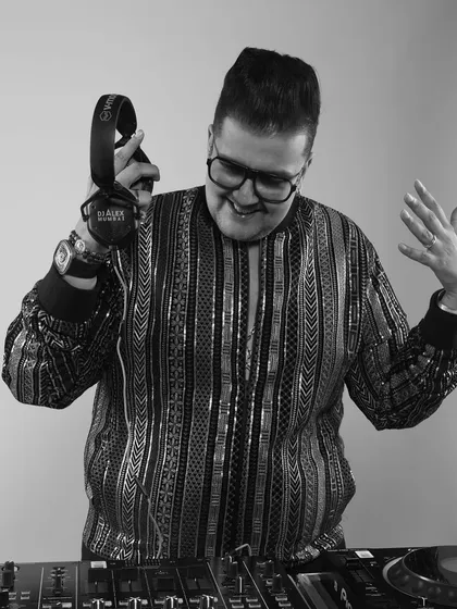 A smiling, happy shot from a black and white photoshoot. It shows the approachable and joyful side of my personality.