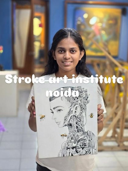 The proud artist with her finished micron pen drawing, a unique and complex piece that blends the organic with the mechanical.