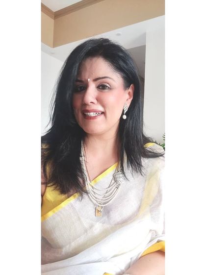 I believe in wearing what makes you happy, today. For this look, I paired my linen saree with my mother's pearls, a sentimental choice that adds personal meaning to the outfit.