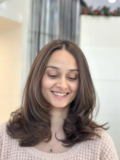 This Soft Melt Brown gives a seamless blend and natural shine. The client's happy smile says it all about this elegant and subtle transformation.