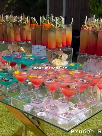 A brunch isn't complete without the perfect drinks. We designed this vibrant, multi-level cocktail bar for an outdoor event, offering a colorful array of mocktails and cocktails to welcome guests in style.