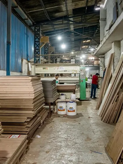 A view of our factory floor, where raw materials are transformed into beautiful kitchen components. Our in-house manufacturing allows us to maintain strict quality control from start to finish.