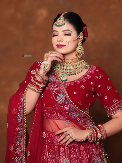 The soft focus on the eyes shows the delicate shimmer and blending work. It’s these small details that create the overall magic of a bridal look.