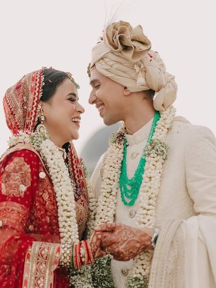 The pure joy of a shared laugh between Mehul and Divya at their Udaipur wedding. We believe the best portraits are the ones that capture your authentic happiness and the easy comfort you find in each other.