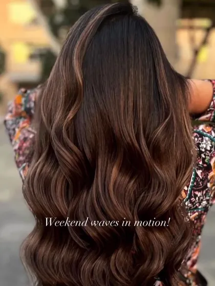 Get ready for the weekend with these gorgeous waves. This is a beautiful example of how a rich chocolate brown base with subtle highlights can create incredible depth and shine, perfect for any occasion.