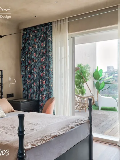 A view from the master bedroom out to the open deck. The seamless connection between the indoor and outdoor spaces makes the room feel larger and more connected to nature.