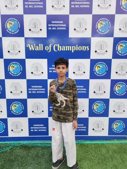 My student Vishul Tanwar with his silver medal from the CBSE Taekwondo Championship 2023, which also qualified him for the Nationals.