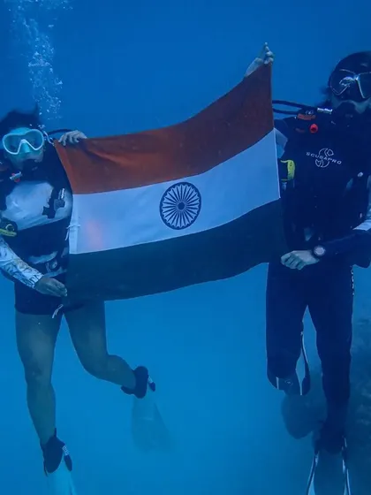 Another proud moment from our underwater flag hoisting for the 75th Independence Day. It's a special experience to show our national pride in the serene blue of the ocean.