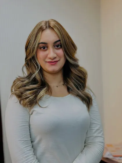 This look proves that ash blonde can be both edgy and soft. The client's happy expression is the best review.