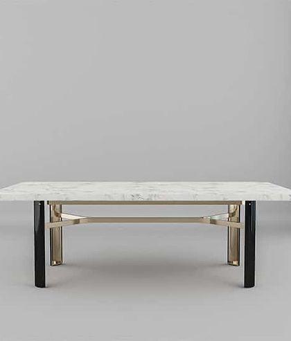A studio shot of the Delight dining table, highlighting its clean, rectangular marble top and the intricate design of its supporting frame.