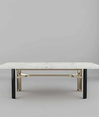 A studio shot of the Delight dining table, highlighting its clean, rectangular marble top and the intricate design of its supporting frame.