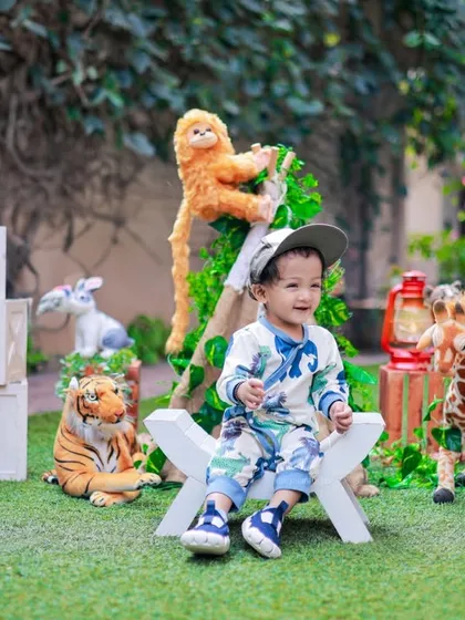 Celebrating one year old with a jungle-themed party in the garden. Combining our props with a natural setting creates a unique and beautiful look.