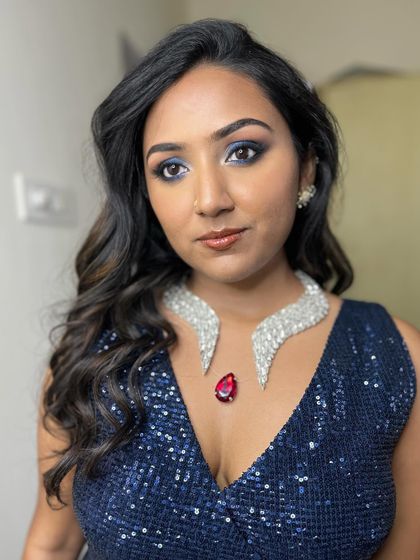 A bold blue smokey glam look for Nimisha's Sangeeth. This is for the bride who isn't afraid to play with colour.