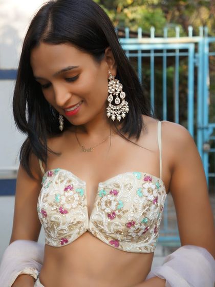 New stock in. This beautiful floral embroidered bustier is a standout piece from our Ivory Edit.