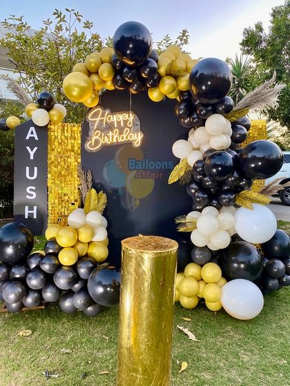 A wider view of the outdoor 21st birthday setup.