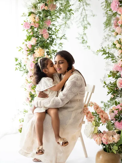 A sweet kiss for mommy. These floral mini sessions are a wonderful way to celebrate the special bond between a mother and her child.