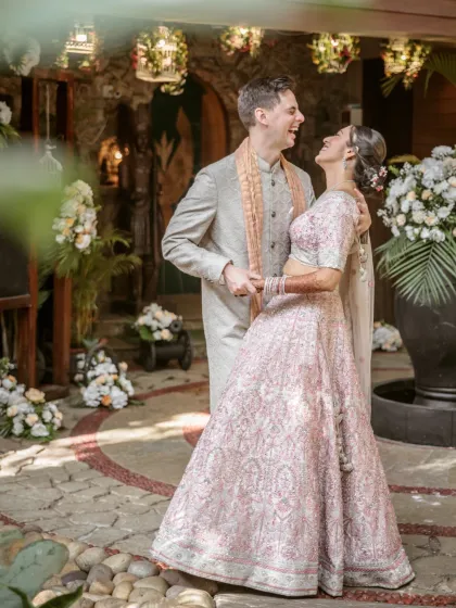 A candid moment of pure laughter and happiness between the couple. These unposed shots are often the most cherished, capturing the true spirit of the celebration.