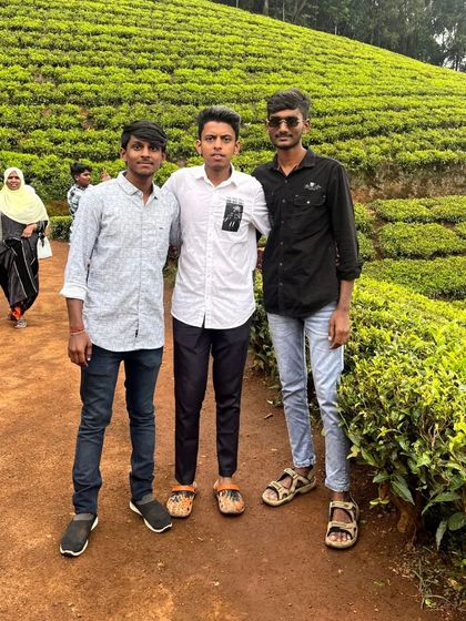 Posing amidst the tea gardens. The rolling green hills are an iconic part of the Ooty experience.
