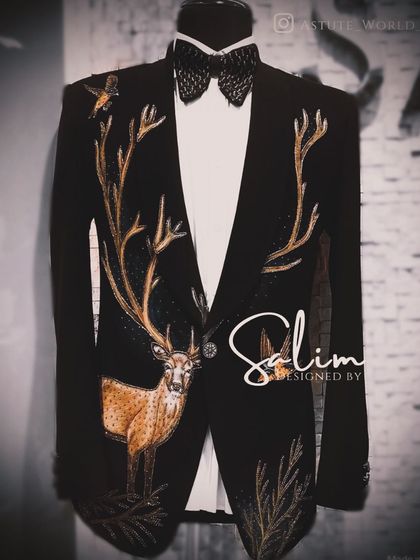 A mannequin displaying a bespoke blazer with a beautifully detailed, hand-embroidered deer. This design is perfect for those who appreciate nature-inspired artistry in their wardrobe.