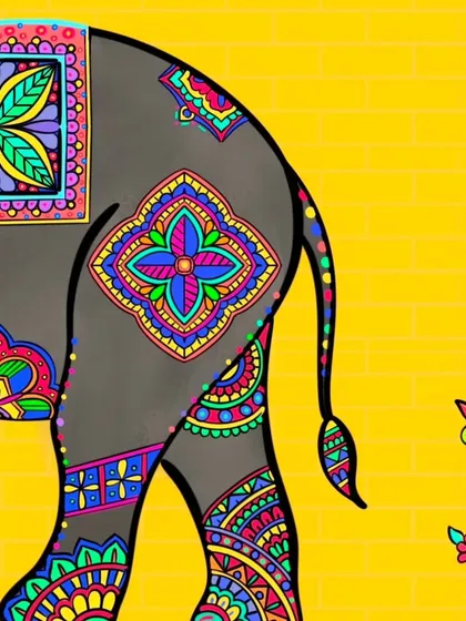 Here you can see the details on the elephant's back, including a saddle cloth with a floral design. The bright yellow background makes the colorful patterns pop, creating a joyful and energetic piece.