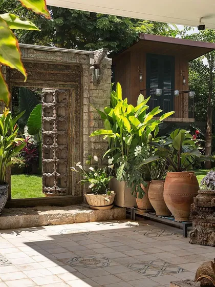 I believe in adding soul to a garden. This antique door, sourced and integrated into a modern landscape at Embassy Boulevard, acts as a stunning artistic focal point, blending history with contemporary design.