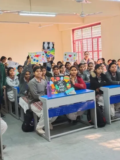 The classroom is full of enthusiastic students participating in our health and nutrition workshop. Educating children on topics like avoiding junk food is crucial for building a healthy society.