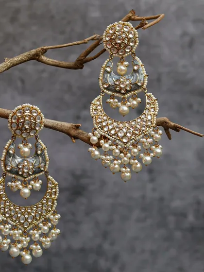 This was one of my most challenging shots. Balancing these heavy, beautiful earrings on a delicate twig took patience, especially with a curious toddler nearby. It’s a frame I’m proud of, showing how rustic elements can highlight intricate luxury.