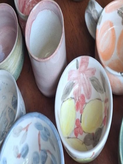 I feel so proud and happy when I see a collection of my students' finished work. These hand-painted bowls and mugs are just beautiful.