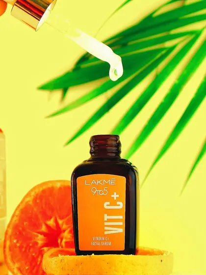 Action and texture are key in my skincare photography. Here, a single drop of Lakme Vitamin C serum is captured mid-air, demonstrating the product's lightweight feel while the vibrant orange background reinforces its core ingredient.