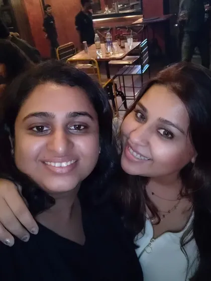A candid photo of our founders, best friends Chef Pooja Sachdev and Khyati Kale. Their shared passion for food and experiences is the foundation of our brand.