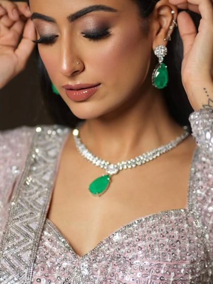 This look is all about enhancing natural beauty. I used soft brown tones on the eyes and a glossy nude lip to create a subtle yet impactful look.