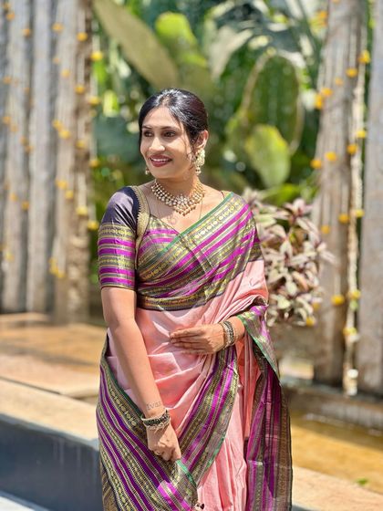 Chaitra Reddy looks stunning in our pink designer silk saree with a vibrant multicolor border, a perfect blend of grace and glamour.