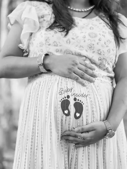 A simple and sweet black and white shot focusing on the main event. This was taken during an outdoor session, using the soft natural light to highlight the baby bump.