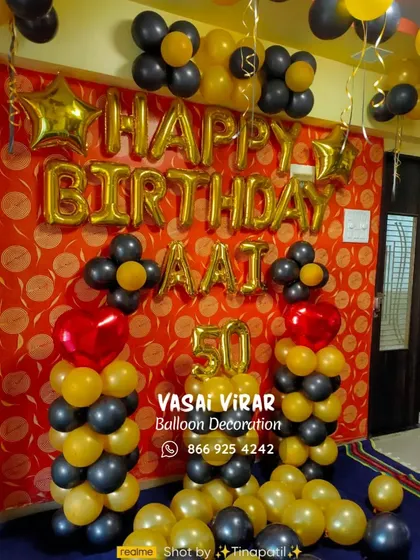 A 50th birthday deserves a grand celebration. For this special milestone for an 'Aai' (mother), we designed a classy black and gold theme with bold balloon columns and foil letters, proving that beautiful decor is for all ages.
