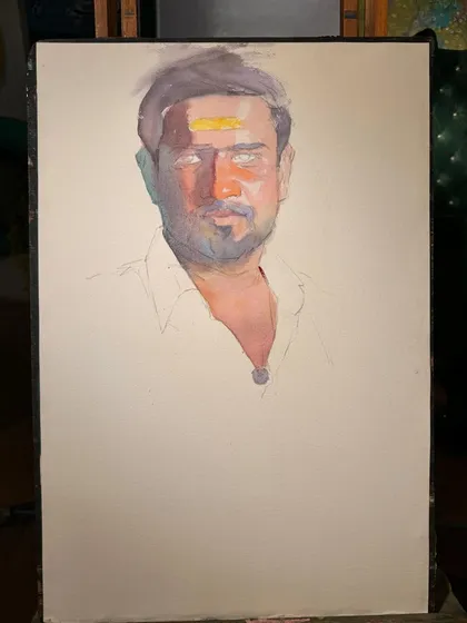 The portrait partway through, with the base skin tones and shadows established.