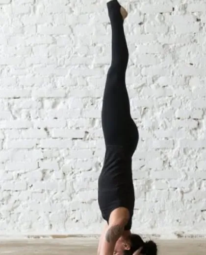 Sirsasana, or Headstand, is a powerful inversion that directs nutrient-rich blood to the entire upper body. This can contribute to stronger nails and overall vitality.