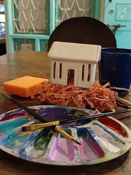 Have you tried Pottery with Puppies? In this unique session, you'll paint a pre-made ceramic house, symbolizing the forever home our shelter pets are looking for.