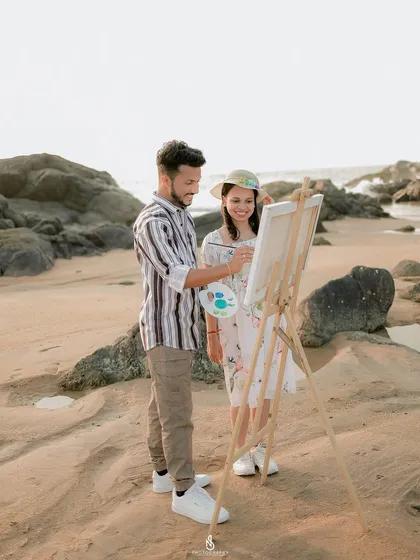 A wider view of the painting setup on the beach. This shows how we can incorporate your hobbies and passions into your photoshoot.