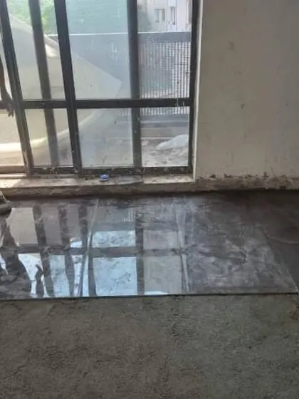 The new flooring at the Unitech Cascades project site is nearly complete, creating a clean and reflective surface that will serve as the base for the rest of the interior work.