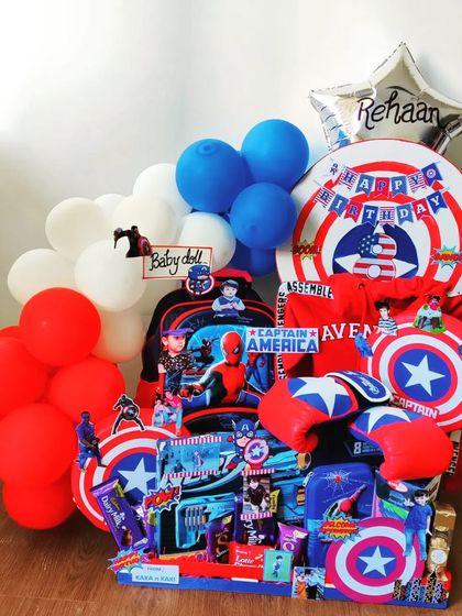 For the Captain America fan, this patriotic red, white, and blue hamper is a perfect choice. It includes themed apparel, boxing gloves, and plenty of shield motifs to celebrate a birthday with superhero strength.