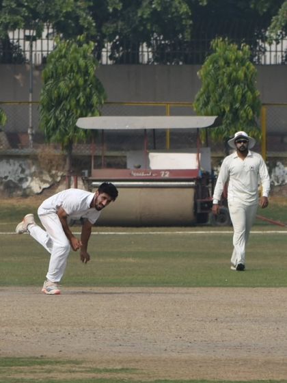 A bowler unleashes a delivery during a practice match. Our coaching program focuses on developing every aspect of the game, from pace bowling to spin and fielding.