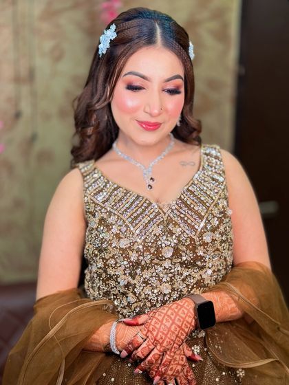 A final look at Kavya's beautiful engagement makeup. The hair accessory adds a touch of elegance.