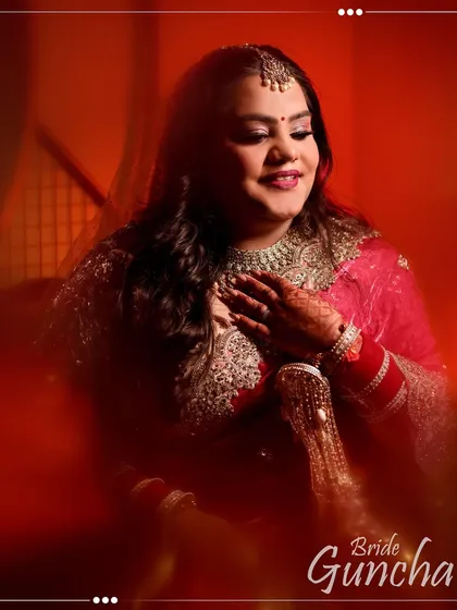 A glowing portrait of the bride, Guncha, in her pink wedding saree, her happiness radiating from the frame.