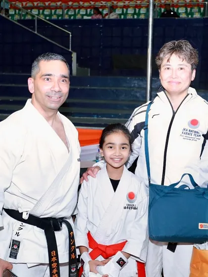It is an honor to provide my students with opportunities to meet and learn from senior instructors from the JKA Headquarters in Japan. Here, one of my students stands with a JKA National Team member, a testament to our direct link to karate's highest tradition.