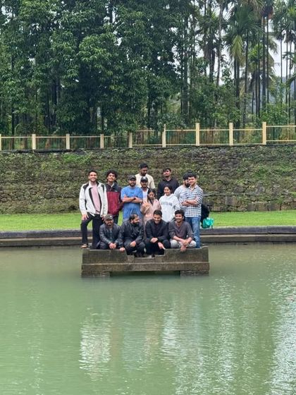 Our group at the serene Devagange temple pond. The water is cool and the surroundings are peaceful.
