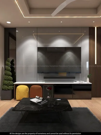 A modern TV unit with a glossy grey finish and vertical wood slats. The design includes open niches with pops of color, adding a playful touch.