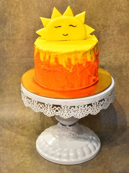 A bright and cheerful "You Are My Sunshine" themed Oreo smash cake. This cake is perfect for a first birthday photoshoot, designed to be fun, messy, and delicious.