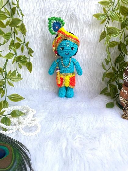 The divine couple, Radha and Krishna. I made this beautiful pair to celebrate the festival of Holi. Radha's lehenga and Krishna's turban are crafted with bright, festive colors.