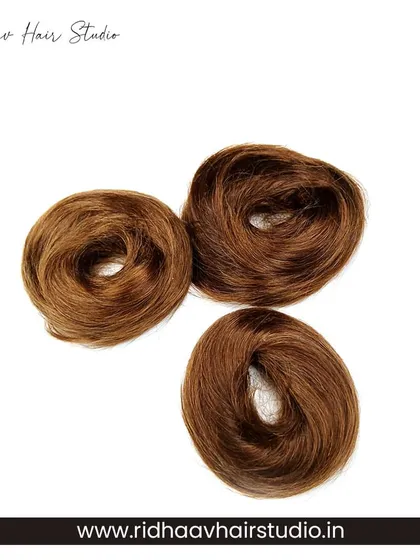 Three of our light brown hair scrunchies, perfect for matching with lighter hair shades or creating a subtle contrast. They add a touch of elegance to any updo.
